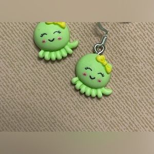 Green octopus earrings with yellow bow